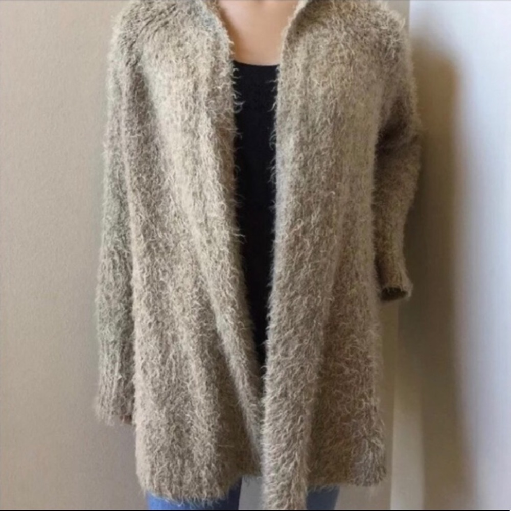 Sleeping on snow fuzzy cardigan